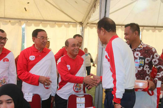 Bupati Harris Hadiri Peringatan HAN di Pekanbaru